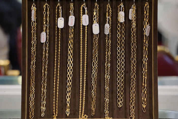 Gold chains on display in a jewellery showroom